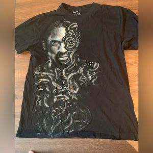 Dry fit Black t shirt with design on it maid by nike size large